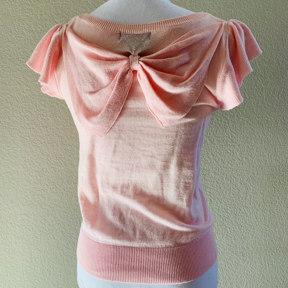 Bow ruffled knit top